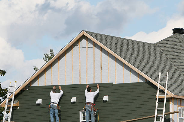 Professional Siding Replacement technician working in Highland Park, IL